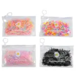 Four packs assorted disposable mini hair rubber bands packed in daisy printed zipper storage bags