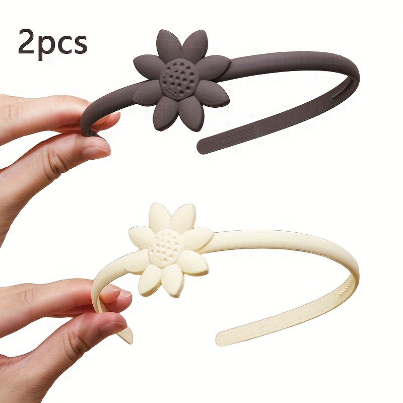 2Pcs Daisy Flower Headbands, Daily Hair Bands for Makeup Washing & Travel Two matte daisy flower decorated thin plastic headbands in dark brown and cream beige for daily hair styling