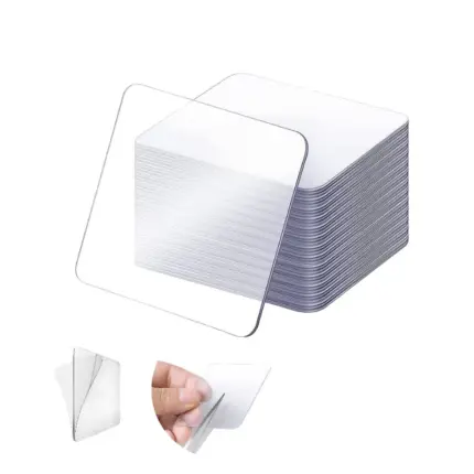 Stack of clear square double-sided adhesive tape pads, removable waterproof sticky mounting tabs for home wall decoration and object fixing