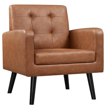 Brown tufted faux leather mid century accent arm chair with black tapered legs for home indoor seating