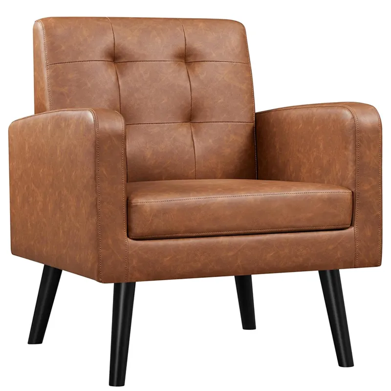 Brown tufted faux leather mid century accent arm chair with black tapered legs for home indoor seating