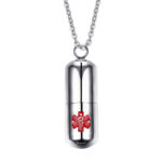 Polished stainless steel openable pill pendant necklace engraved with red medical alert symbol, wearable emergency identification jewelry for daily safety protection and medical