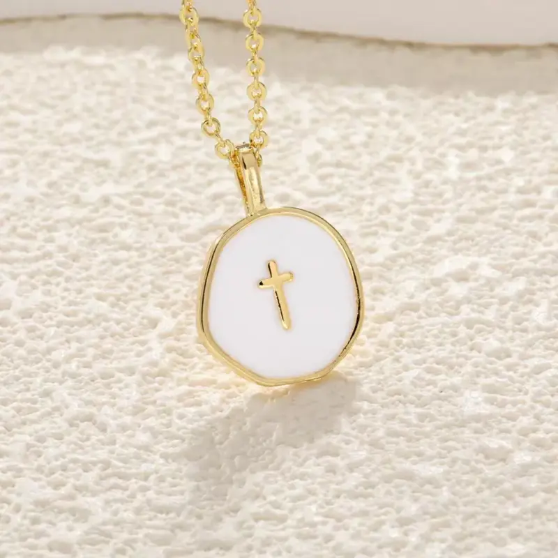 Gold link chain necklace with irregular white enamel round pendant embossed with small cross, minimalist religious wearable jewelry for women daily styling