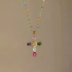 Gold chain necklace with multi-color rainbow crystal cross pendant, dainty colorful gem statement jewelry for daily casual and party outfit styling
