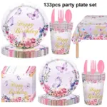 Purple butterfly and pink flower printed disposable birthday party tableware set with paper plates, cups, napkins, tablecloth and plastic cutlery for birthday celebration decoration